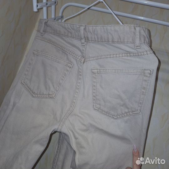 Джинсы с разрезами