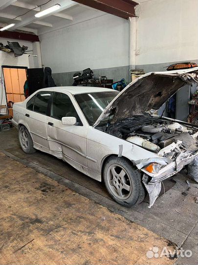 Запчасти на bmw е318i