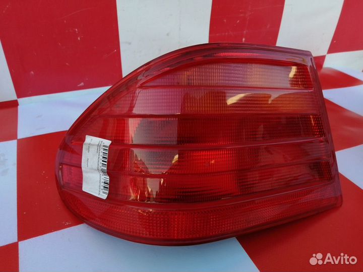 Фонарь задний левый оригинал Мерседес W210