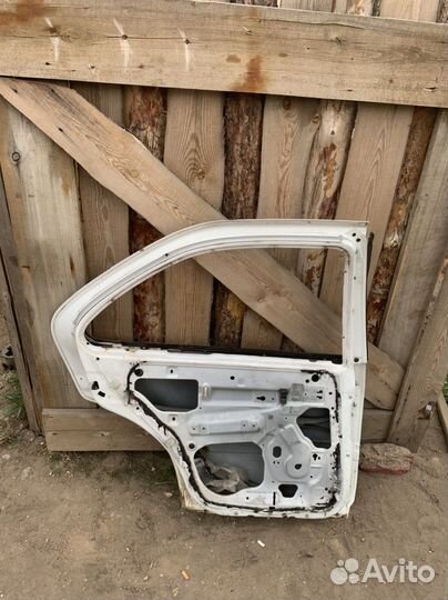 Дверь задняя левая nissan sunny B14