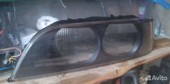 Стекло левой фары BMW 5 E39