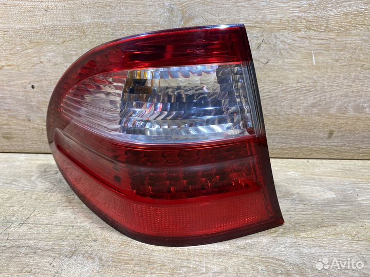 Фонарь левый Mercedes W211 универсал Арт. 111055