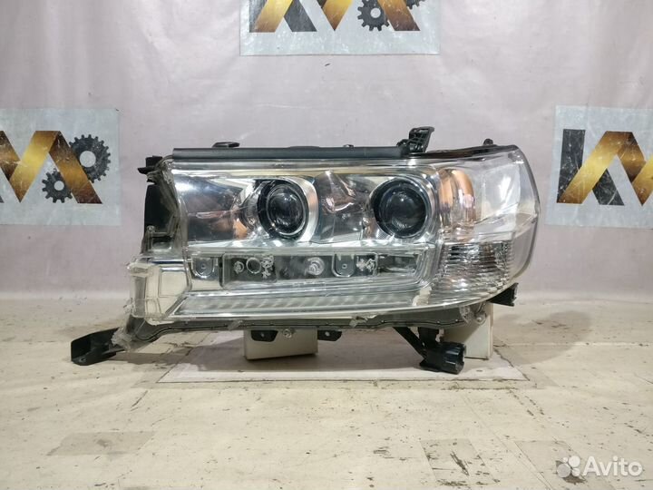 Фара Левая 15- Toyota Land Cruiser 200 Бу оригинал