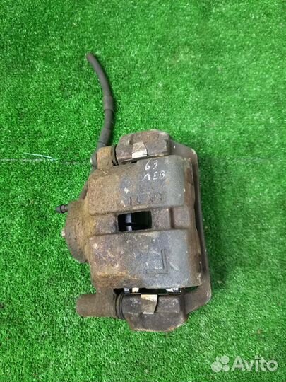 Суппорт тормозной передний левый Mazda Mazda6 GG