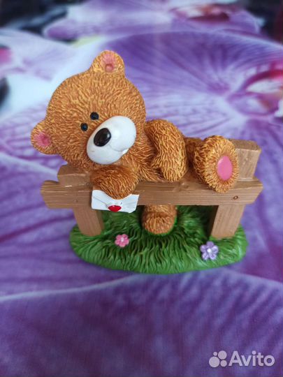 Мишка у заборчика