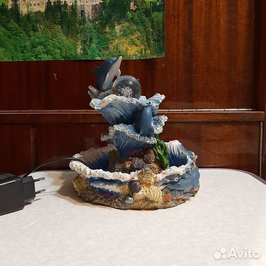 Фонтан с дельфином