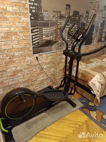 Эллиптический тренажер torneo