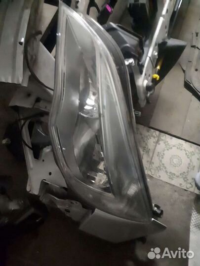 Фара левая Астра J