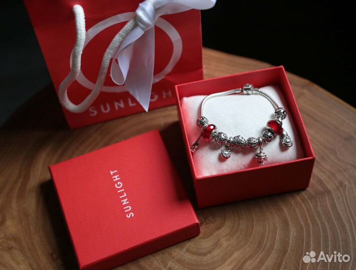 Серебряный браслет с шармами