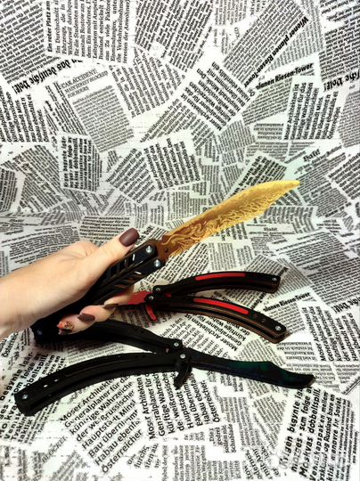 Деревянный нож бабочка