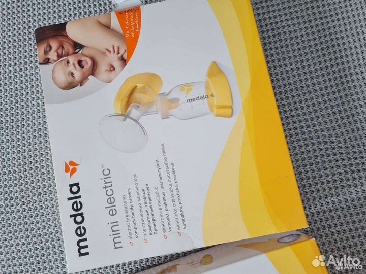 Молокоотсос medela электрический