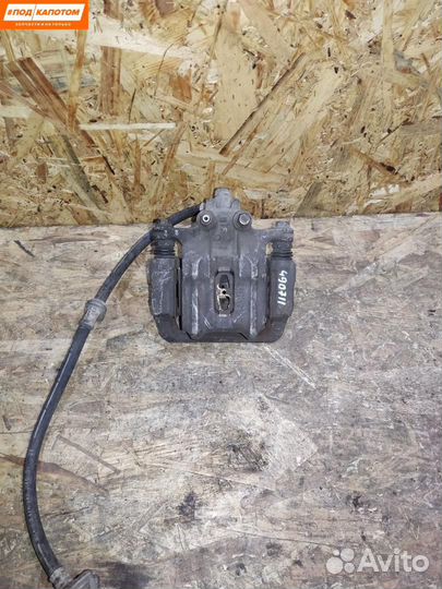 Суппорт тормозной задний левый Honda CR-V 3