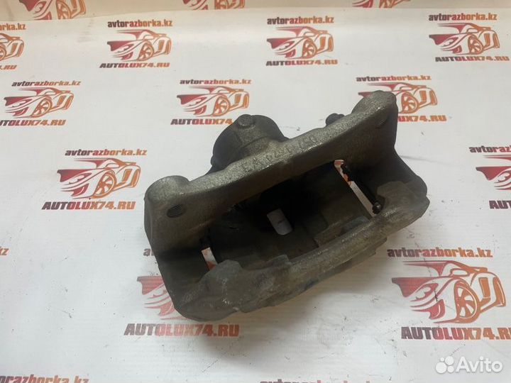 Суппорт тормозной передний левый Mazda 3 BM