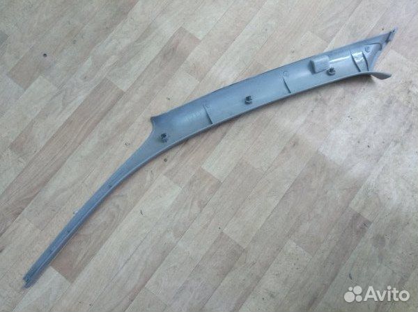 Обшивка стойки передняя правая Kia Spectra седан