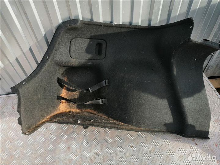 Обшивка багажника задняя левая Hyundai Solaris 2