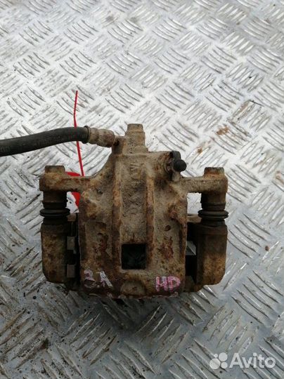 Суппорт задний левый Hyundai Elantra HD 1.6 G4FC