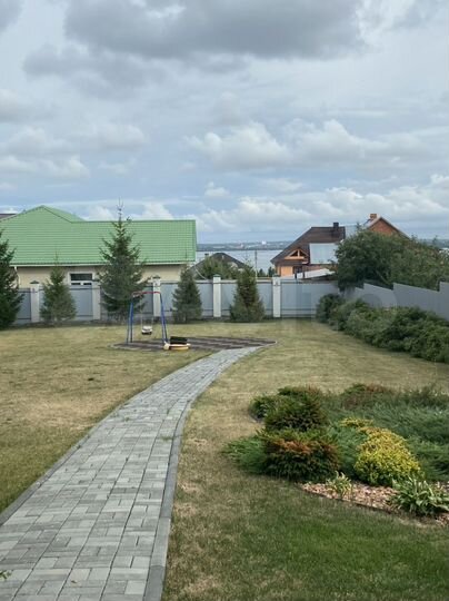 Коттедж 309,8 м² на участке 14 сот.