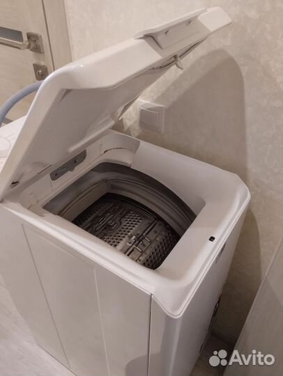 Стиральная машина с вертикальной загрузкой
