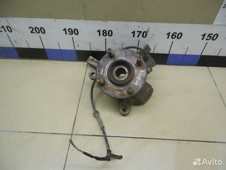 Кулак поворотный передний левый Micra (K11E) 1992