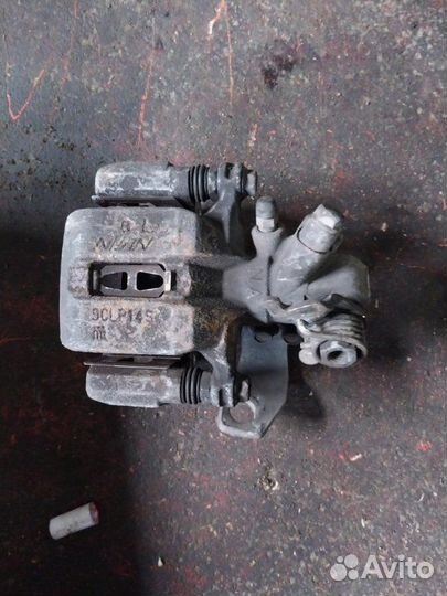 Суппорт тормозной задний левый Honda Civic 8 4D