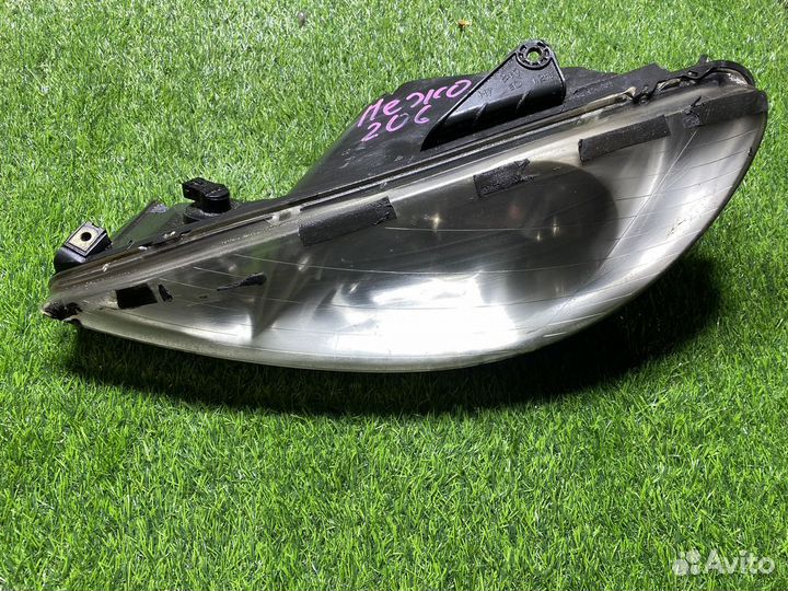 Фара левая Peugeot 206