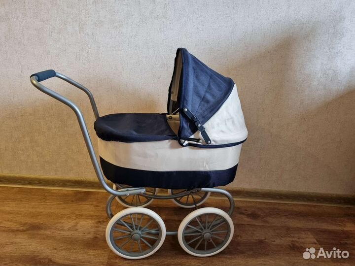 Игрушечная коляска для кукол