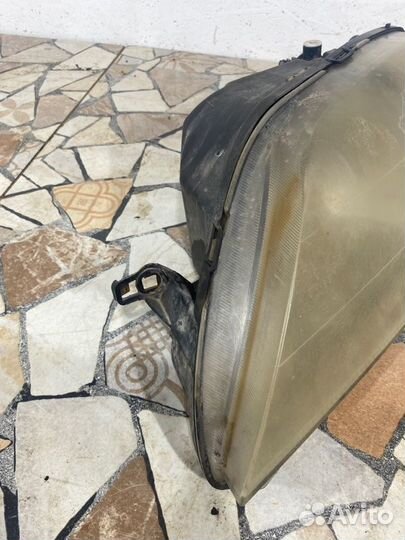 Фара галогеновая передняя левая Renault Logan