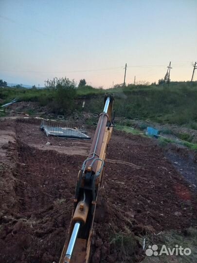 Услуги экскаватора погрузчика