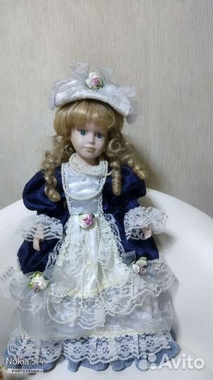 Коллекционная фарфоровая кукла