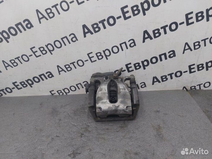 Суппорт с электроручником задний левый Land Rover