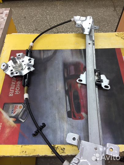 Стеклоподъемник механический передний левый Нексия