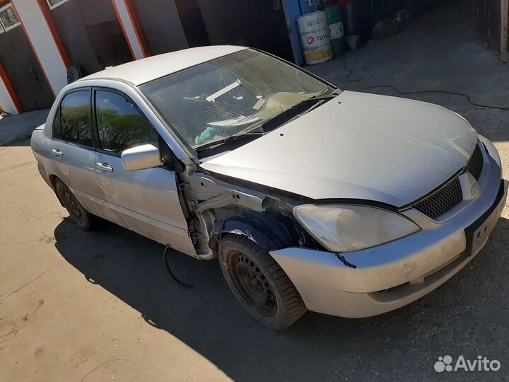 Митсубиси Лансер 9 вентилятор основной