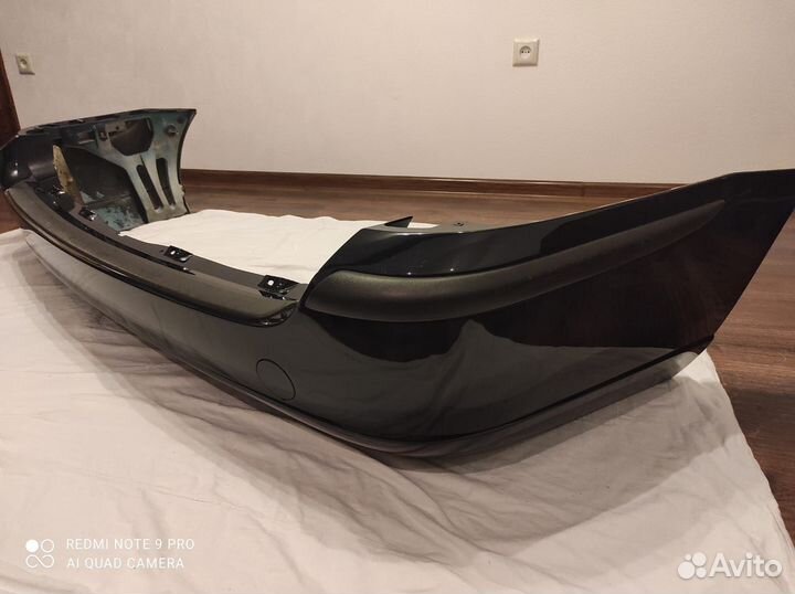 Задний бампер Ford Focus 1 (оригинал) кузов универ