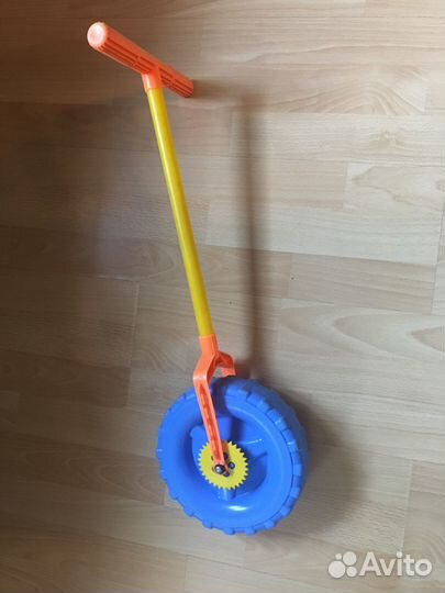 Колесо с ручкой игрушка