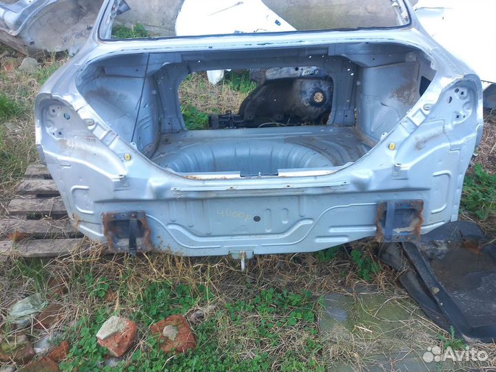 Задняя панель фартук Киа Спектра