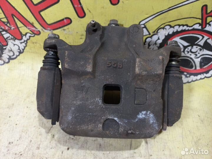 Суппорт тормозной передний правый Nissan Teana J31