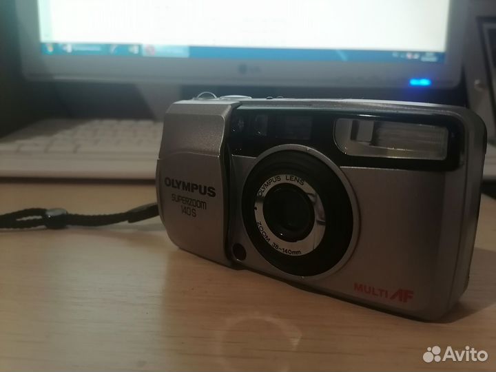 Плёночный фотоаппарат Olympus superzoom 140S