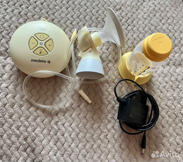 Электрический молокоотсос medela swing
