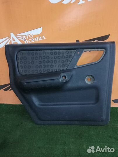 Обшивка боковой двери задняя левая Газ 31105 406
