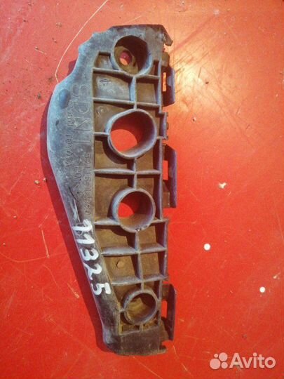 Кронштейн бампера передний левый Toyota Corolla