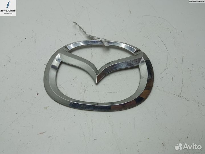 Эмблема на Mazda 5