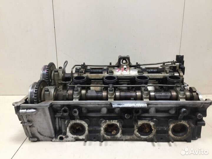 Б/У Головка блока цилиндров 11121555075 BMW