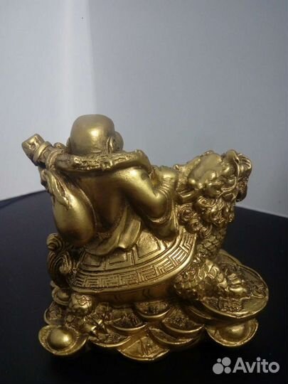 Хотей на драконочерепахе