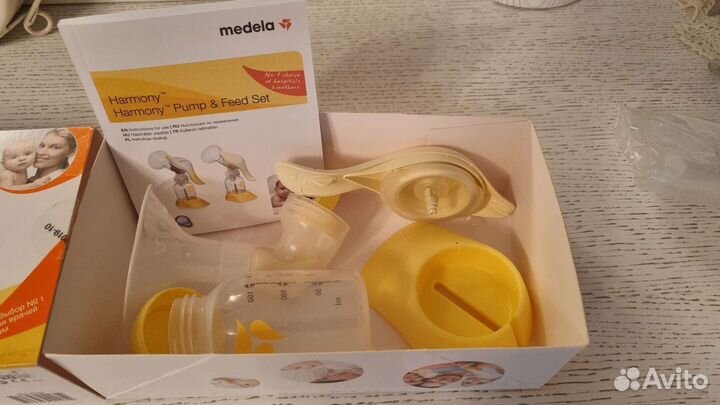 Молокоотсос электрический medela+ ручной medela