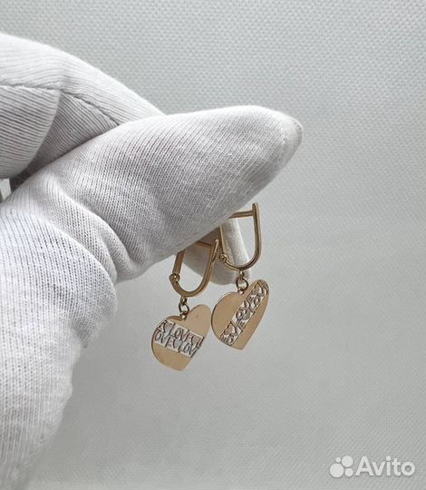Золотые серьги с подвесками сердечками