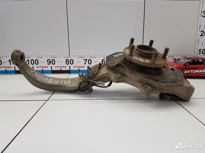 Кулак поворотный передний левый в сборе