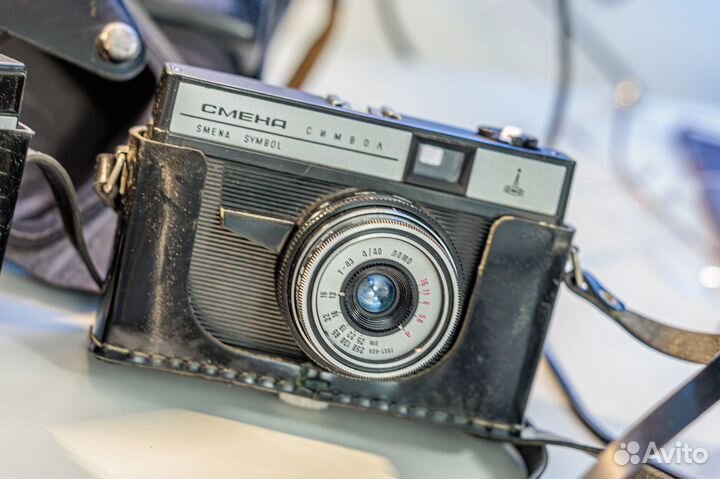 Фотоаппараты смена 8м и символ