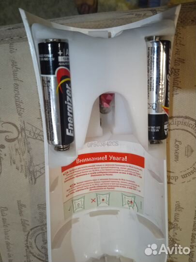 Автоматический диспенсер (освежитель воздуха)