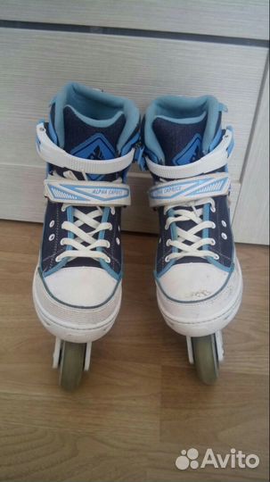 Роликовые коньки