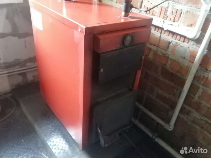 Автоматический твердотопливный котел